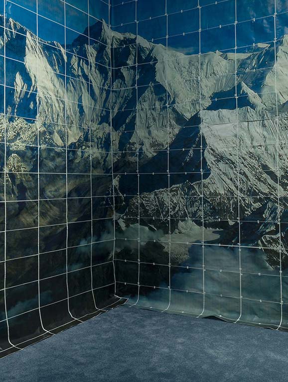 Large-scale constructed design of snowy mountains on gallery wall
